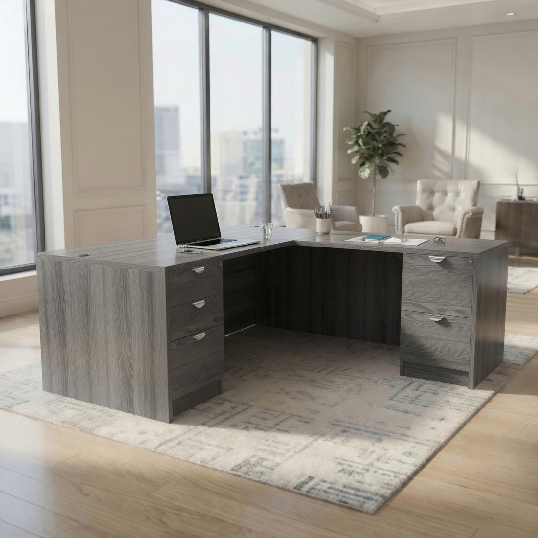 Bellagio L-shaped desk in gray wood grain in a corner office with city windows