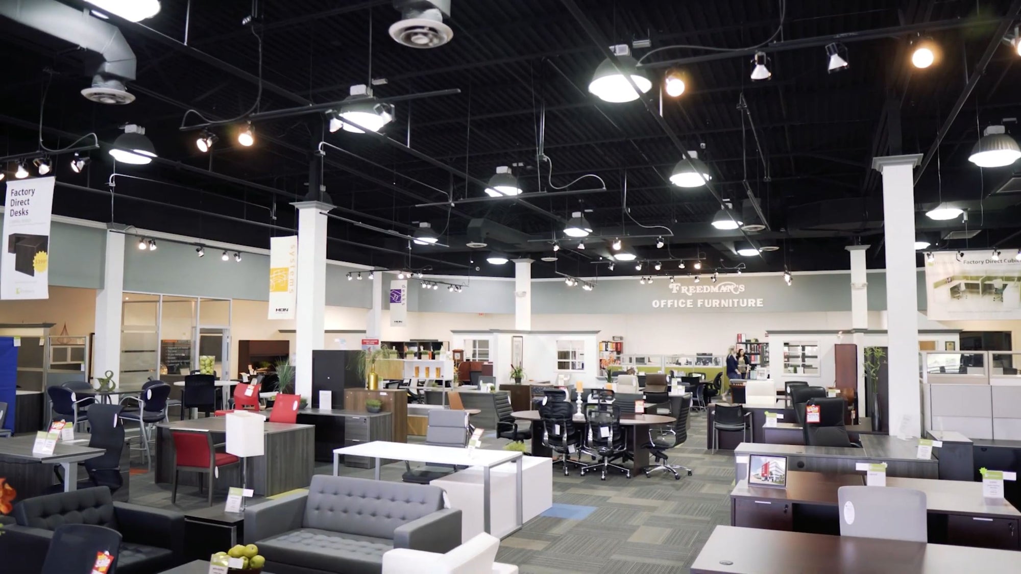 Freedman's Tampa showroom with desks and seating on display
