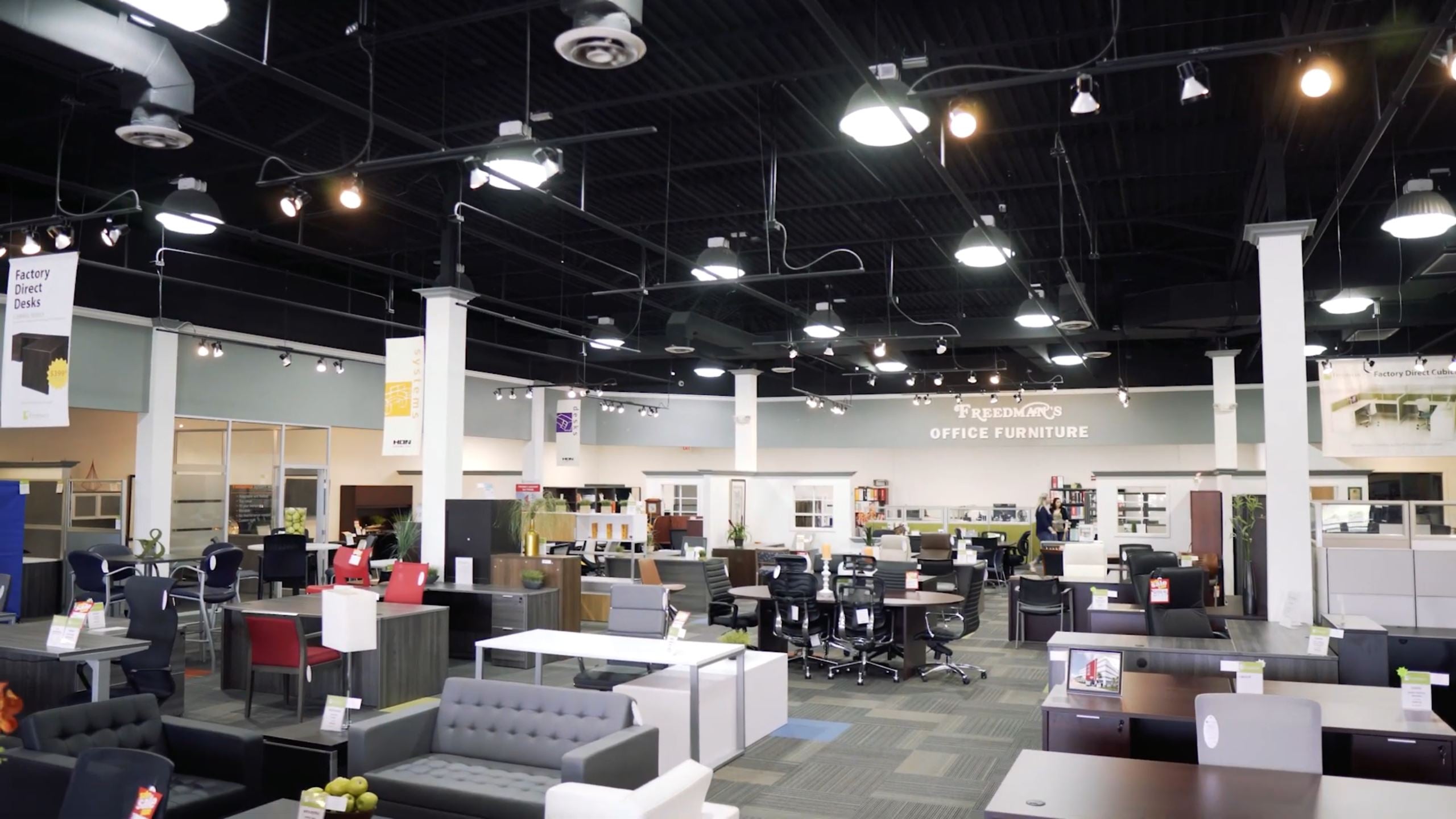 Freedman's Tampa showroom with desks and seating on display